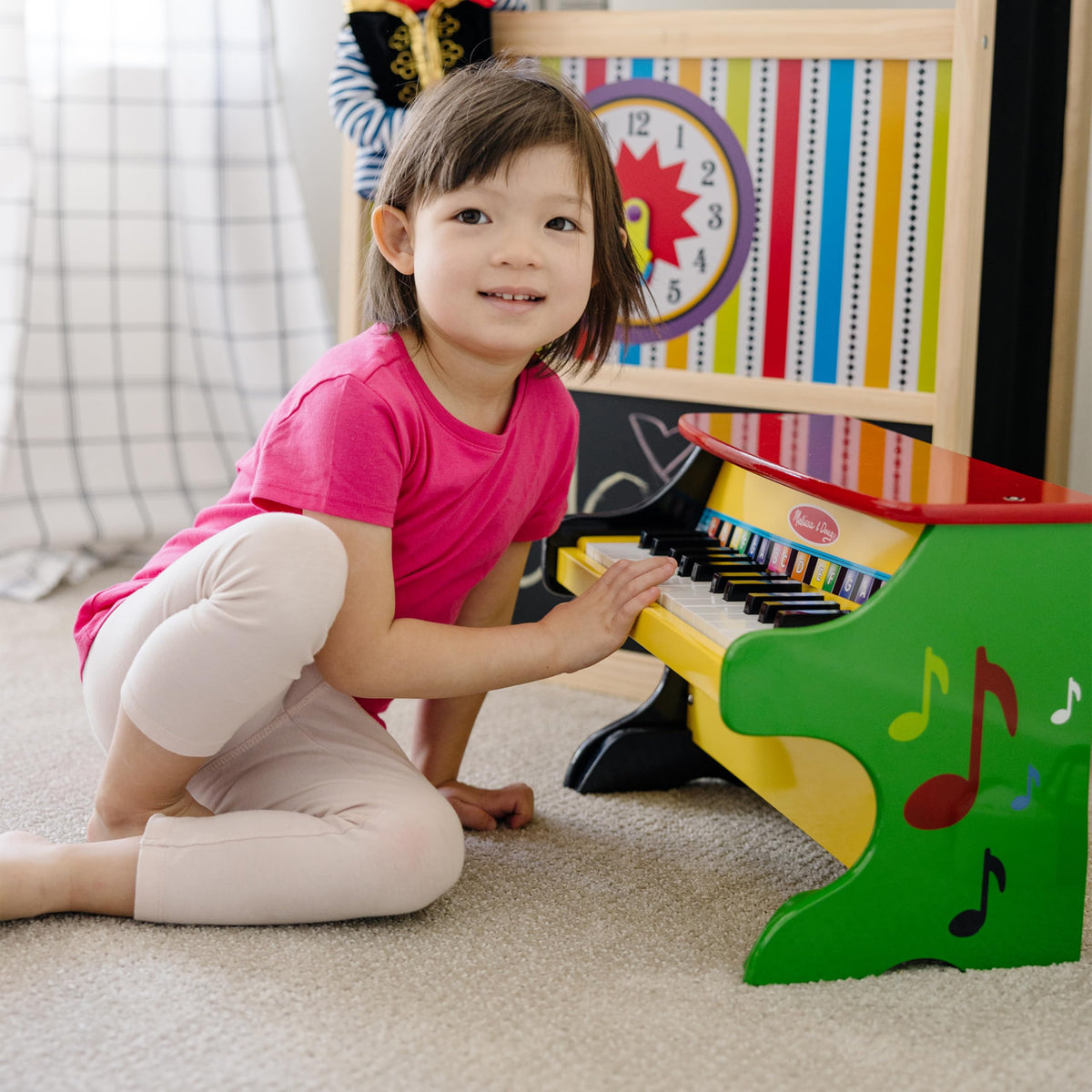 Melissa & Doug Learn-to-Play Piano measures 11.5 x 15.75 x 9.5 inches for compact play space.