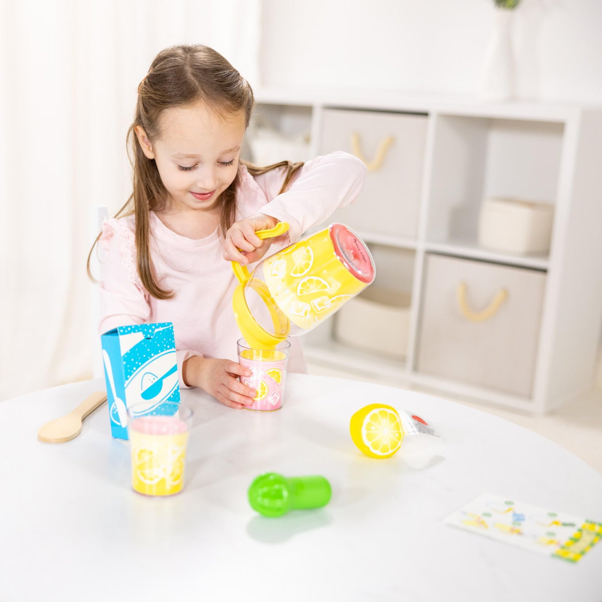 Melissa & Doug lemonade design with cheerful slices and ice cubes sparks imaginative lemonade stands.