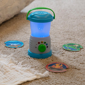 Melissa & Doug Let’s Explore lantern requires three AA batteries to power sounds.