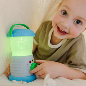 Melissa & Doug Let’s Explore lantern color dial and sound button enhance playtime.