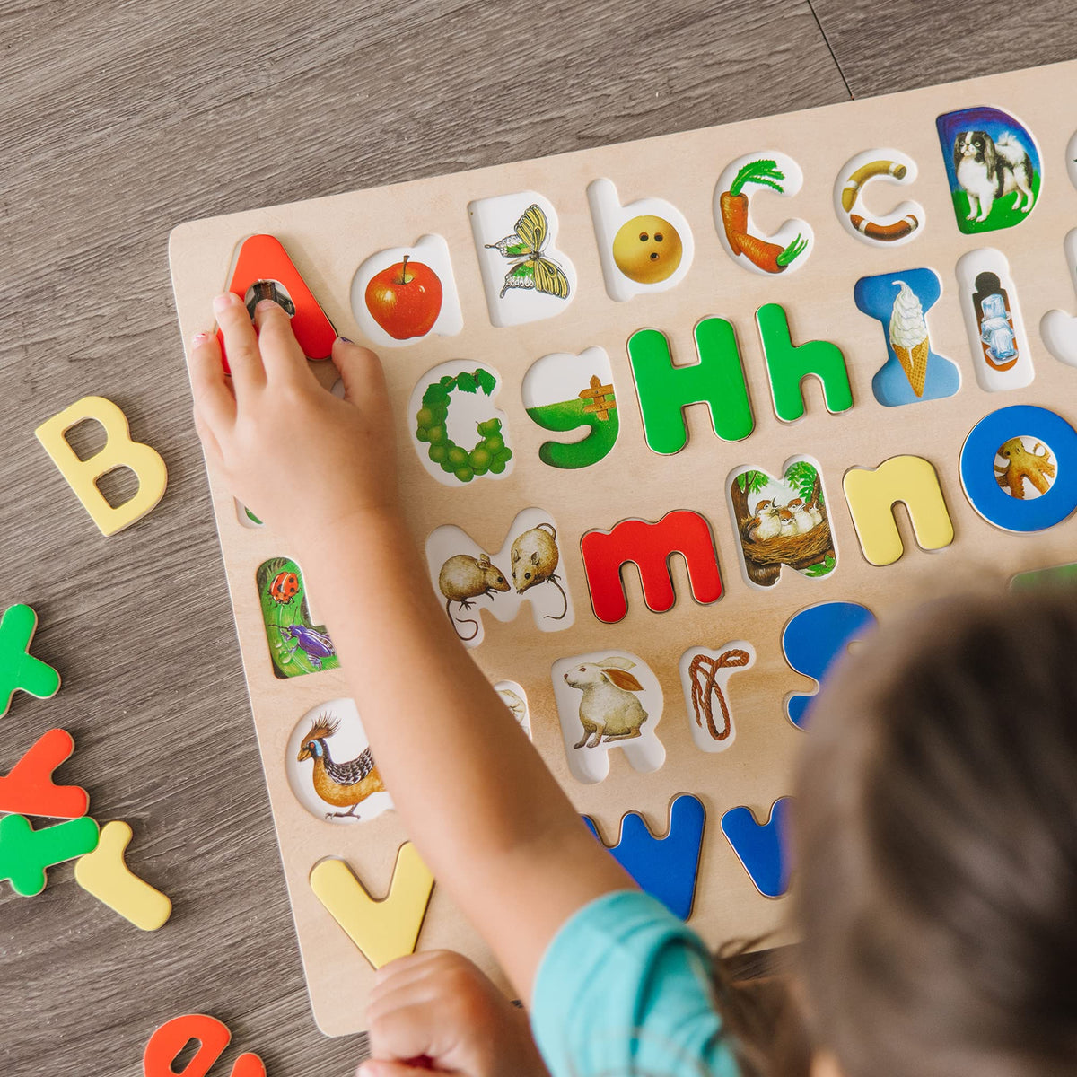 Melissa and Doug letters on wooden board supporting hands-on learning