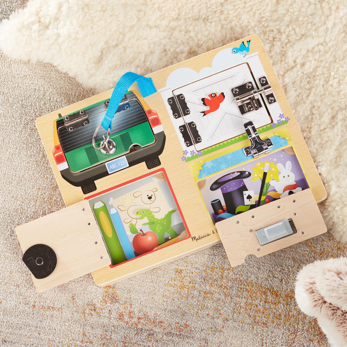 Safe, wooden design of Melissa and Doug Locks and Latches Board supports independent play.