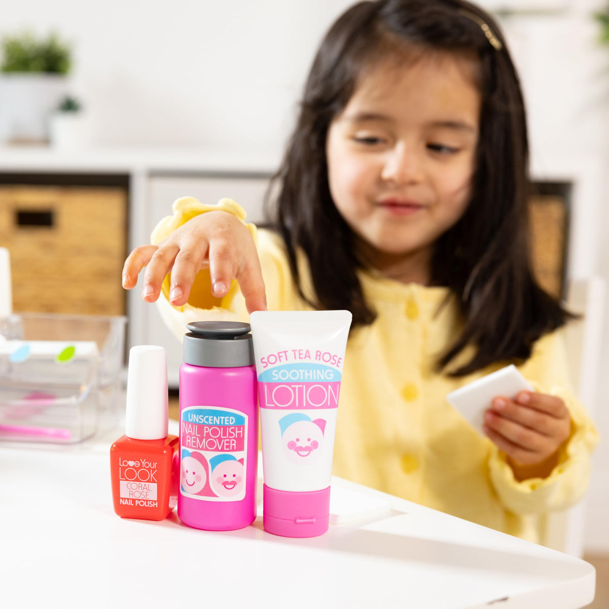 Melissa and Doug Love Your Look clear caddy and activity card storage.
