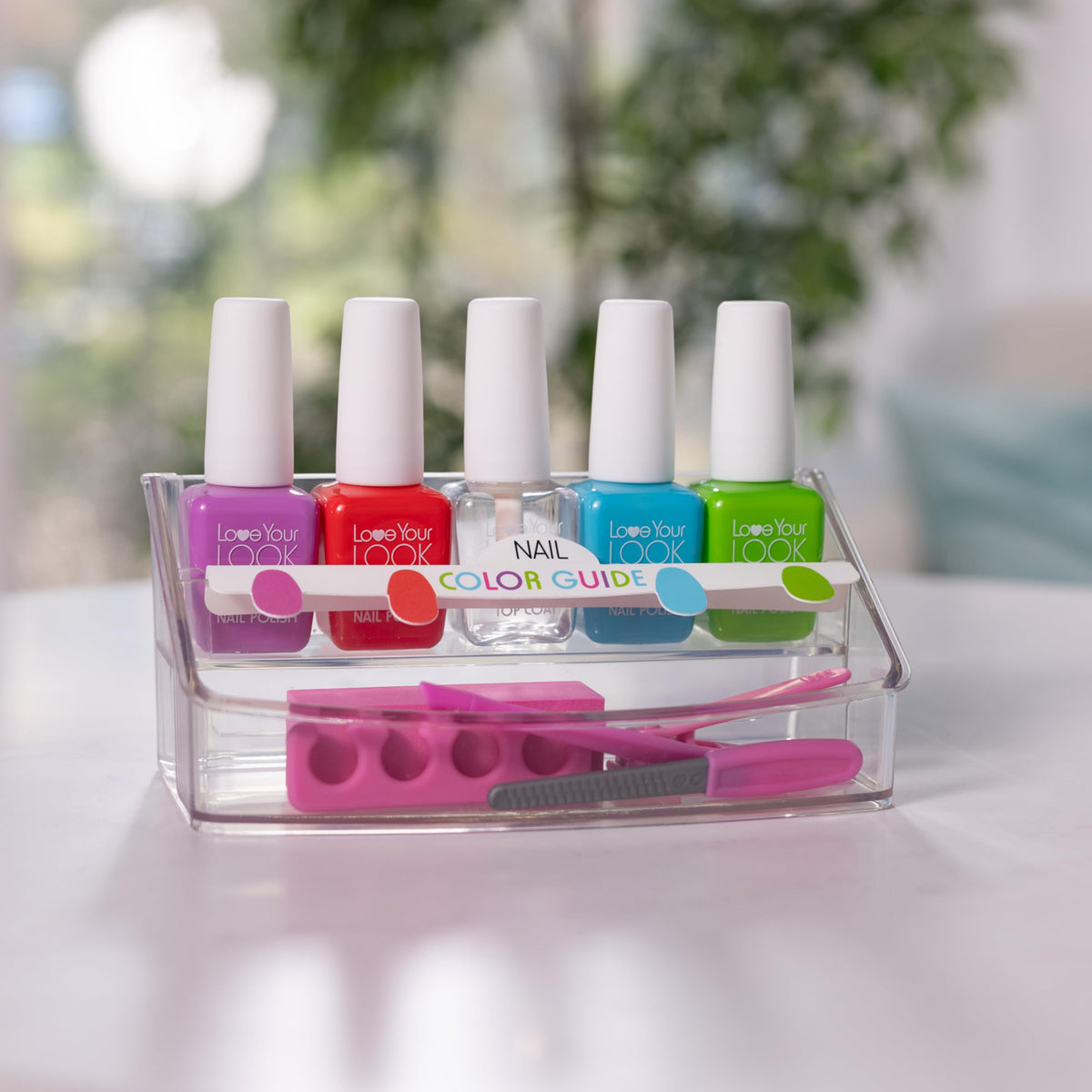 Melissa and Doug Love Your Look pretend nail polish bottles display on tabletop.