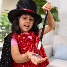 Melissa & Doug magician costume coin adds tactile props for routines.