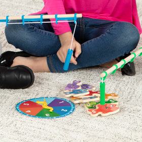 Melissa & Doug magnetic hook catching a fish during play