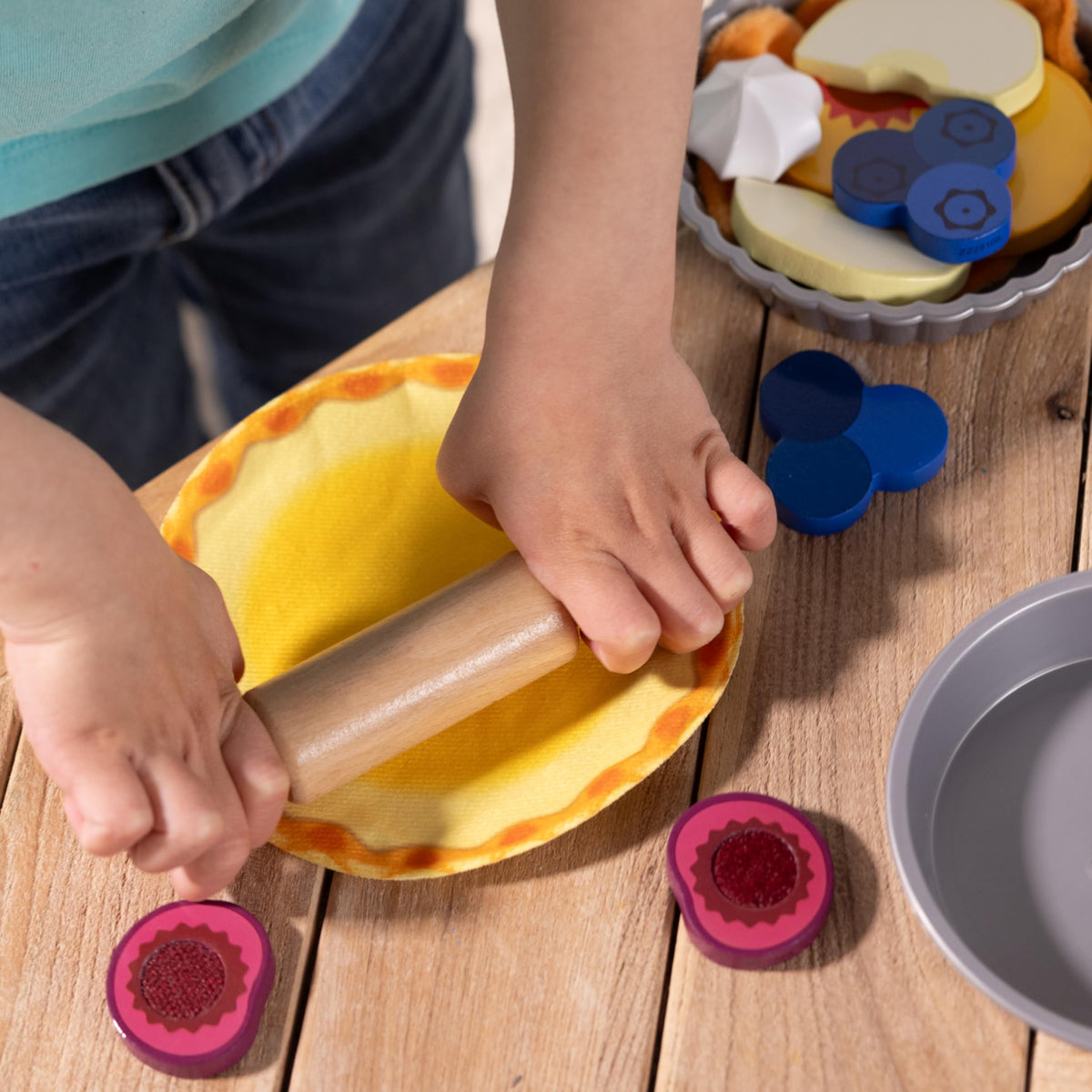 Melissa & Doug Make and Bake pies wooden cutting board enables safe, realistic prep