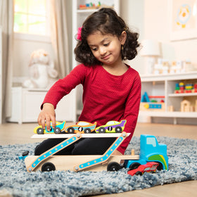 Melissa and Doug Mega Race-Car Carrier side view for extended play