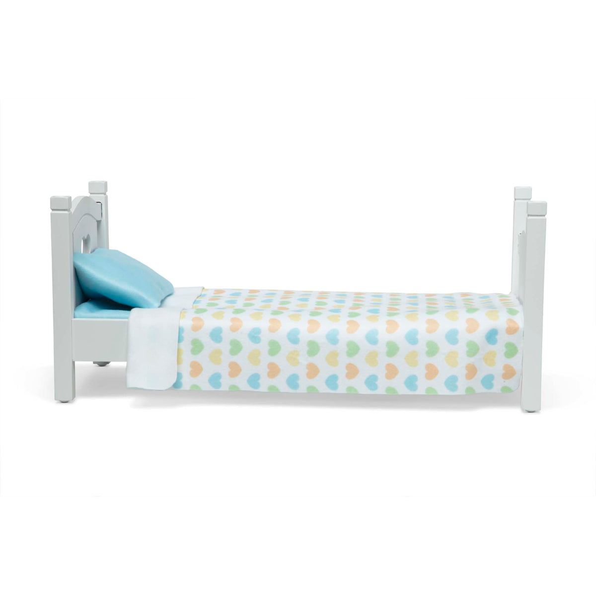 Dolls settled in Melissa & Doug Mine to Love bed at bedtime scene