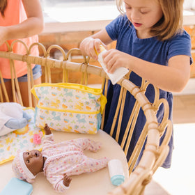 Melissa and Doug changing mat detail helps create authentic caregiving scenes for play.