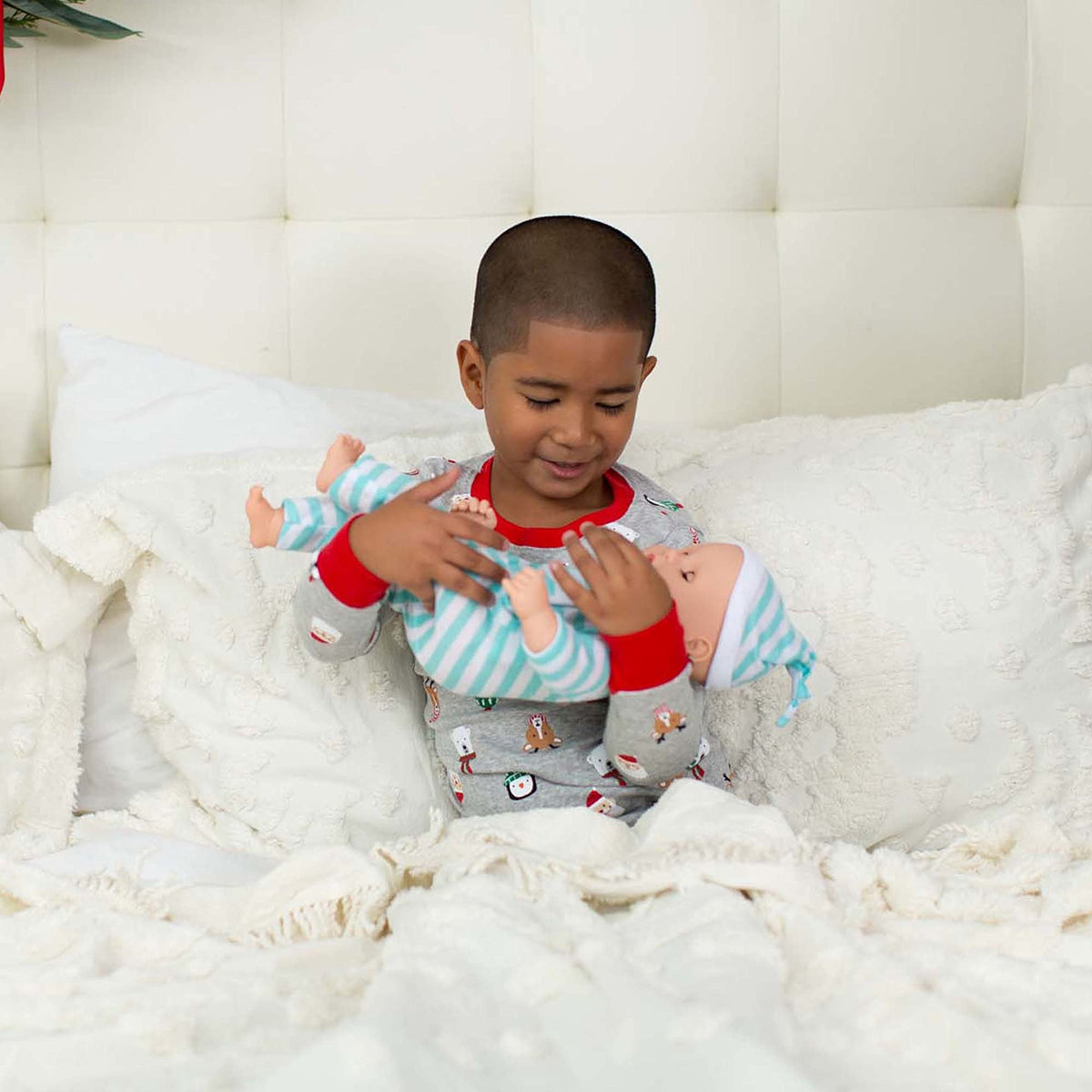 Ideal gift for toddlers 18 months and older: Luke & Lucy twin dolls.