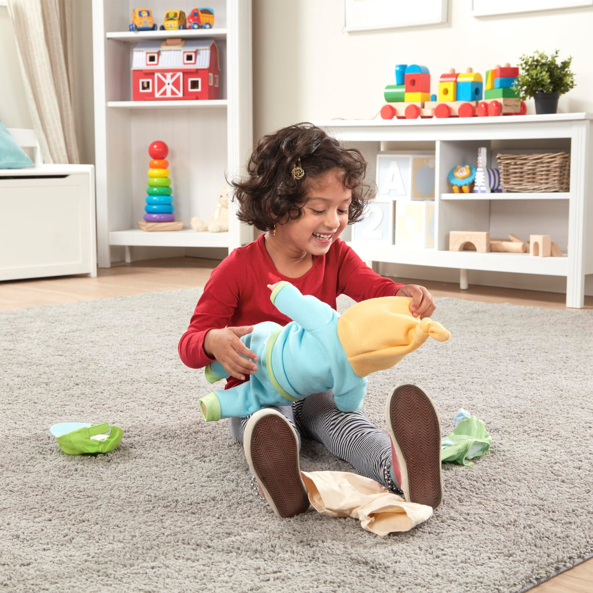 Melissa & Doug Mine to Love puppy dog T-shirt on 12-18 inch dolls encourages versatile styling.