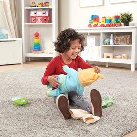 Melissa & Doug Mine to Love puppy dog T-shirt on 12-18 inch dolls encourages versatile styling.