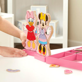 Melissa & Doug Minnie Mouse and Daisy Duck wooden dolls on stands for imaginative dress-up play