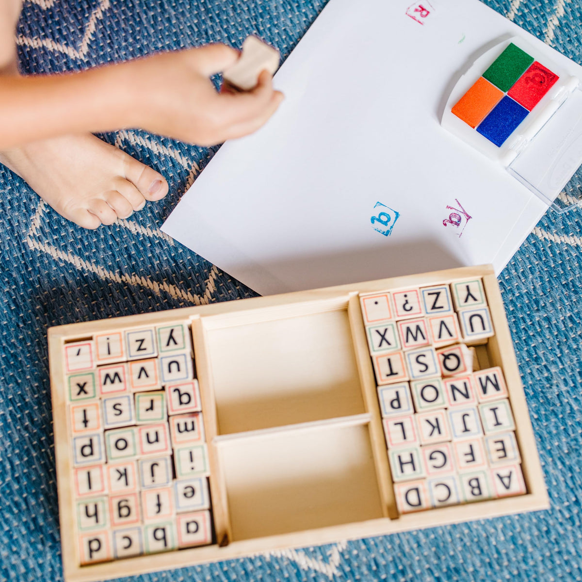Mix-and-match stamps to build words during imaginative play