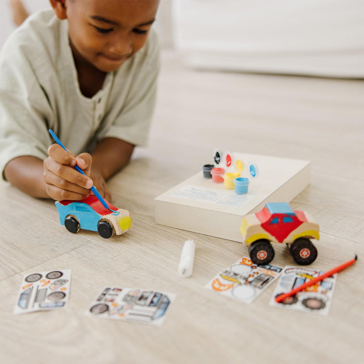 Melissa & Doug Monster Truck kit ready for decorating with paints and stickers.