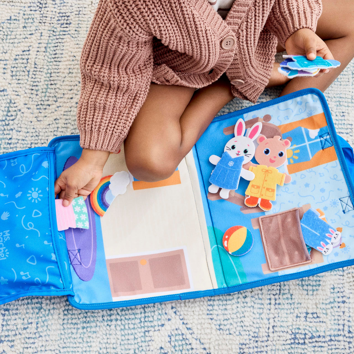 Seasons and outfits on the Ms. Rachel felt board for imaginative play
