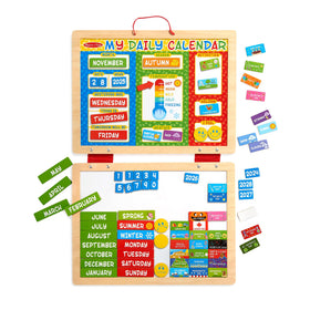 Melissa & Doug My First Daily Magnetic Calendar board displaying date, weather, and activities.