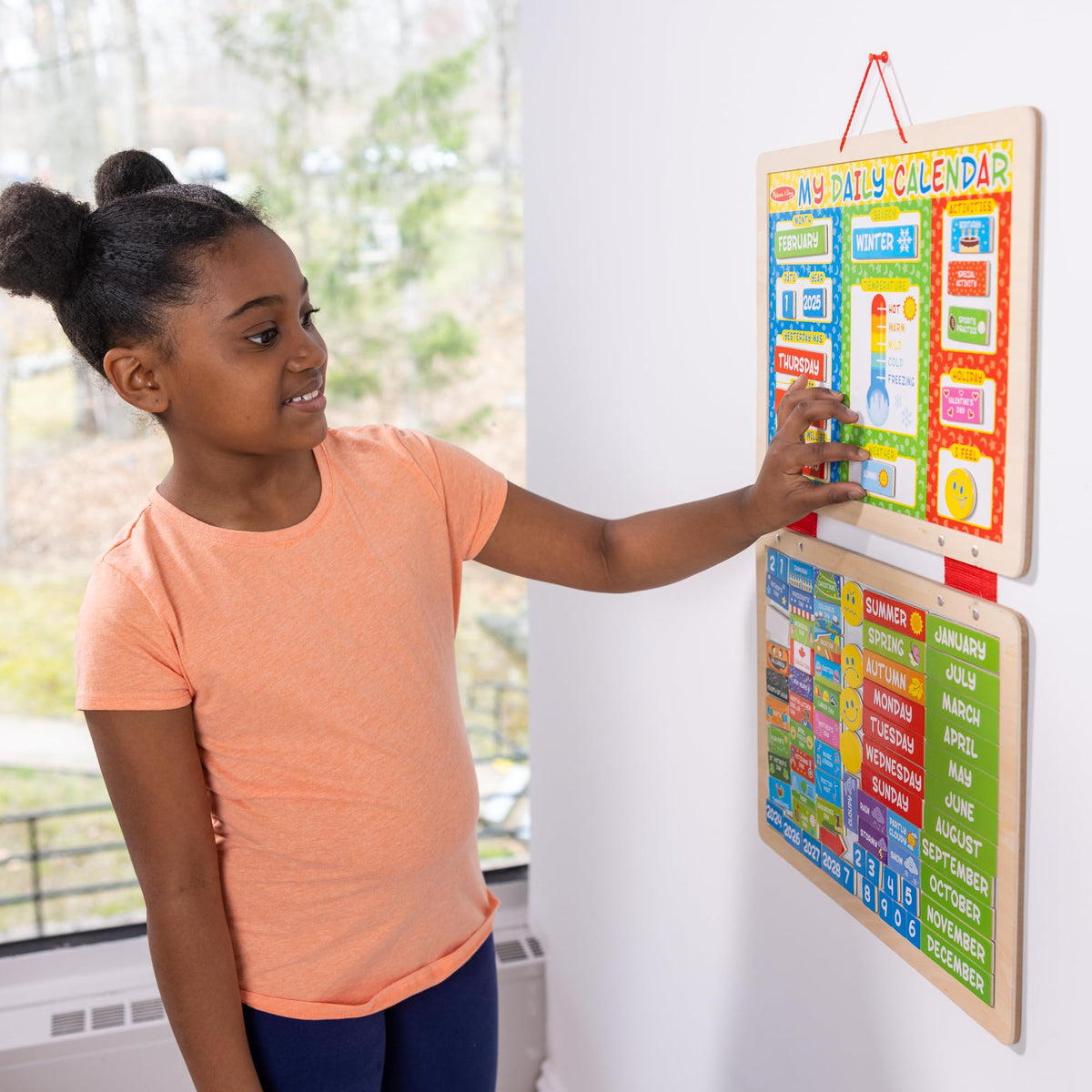 Melissa & Doug magnets set with years, months, days, holidays, and moods for daily planning.