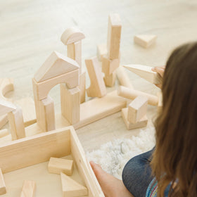 Close-up of natural-finish hardwood blocks, smooth edges, safe for little hands