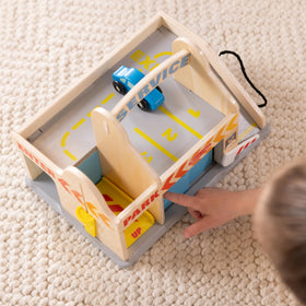 Painted wooden cars included with Melissa & Doug parking garage