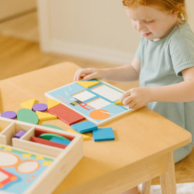 Melissa & Doug Pattern Blocks boards showing recessed templates for guided play