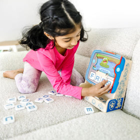Close-up of PAW Patrol letter tiles aiding early spelling practice