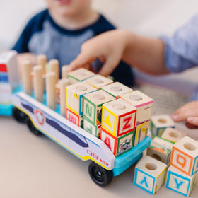 Trailer dowels securely hold blocks during stacking and building.