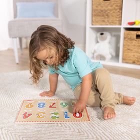 Melissa & Doug Lift & See helps refine fine motor skills.