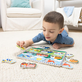 Close-up of Melissa & Doug peg pieces shows sturdy, easy-to-grasp pegs for small hands