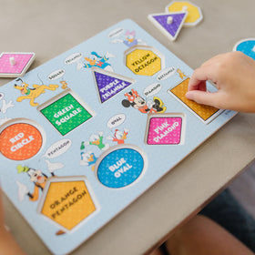 Pegs provide easy grip for little hands during placement.