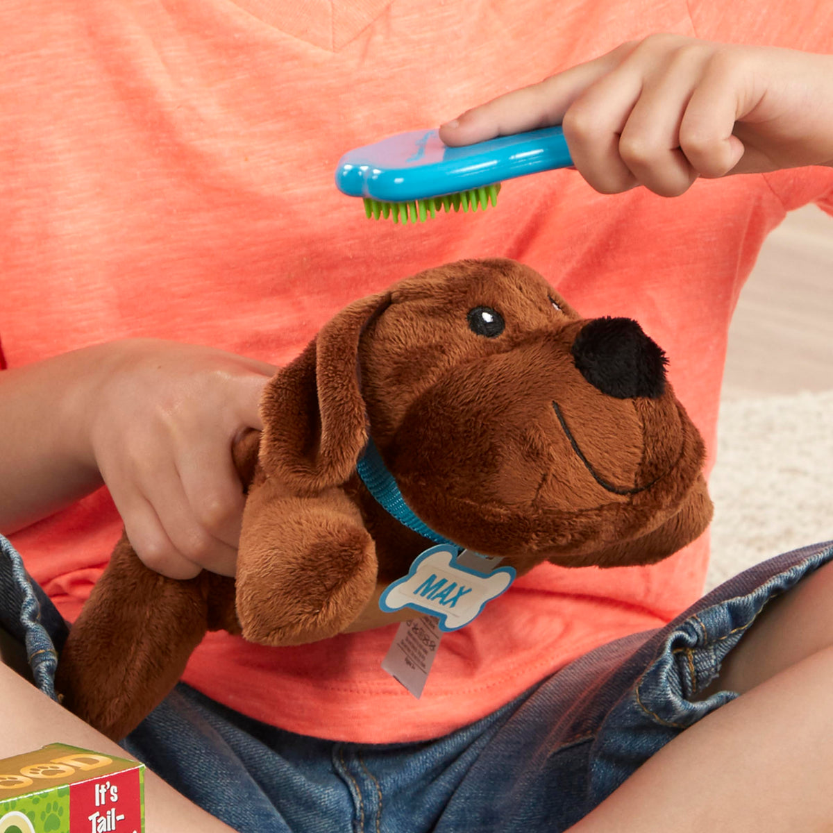 Melissa & Doug feeding mat keeps play area neat during vet station setup