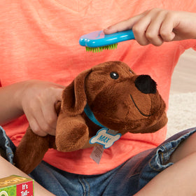 Melissa & Doug feeding mat keeps play area neat during vet station setup