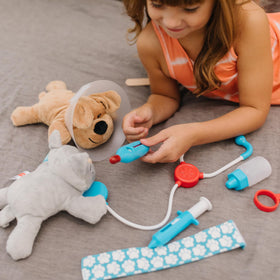 Melissa and Doug pet vet bottles for pretend medicine and dosage demos.