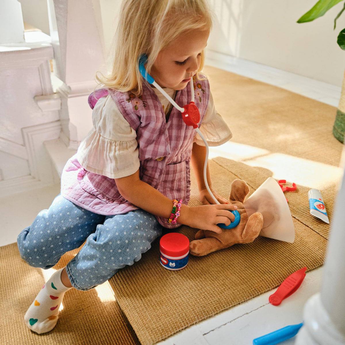 Melissa and Doug pet vet thermometer helps kids practice wellness checks at home.
