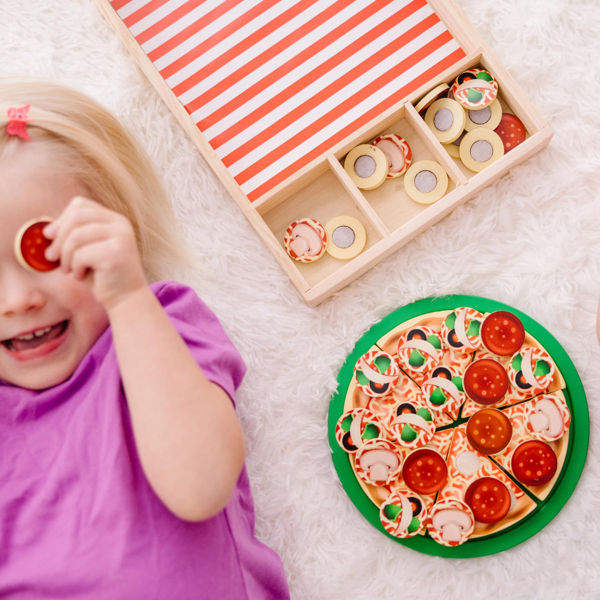 Melissa & Doug pizza play set fits with other kitchen toys for expanded stories