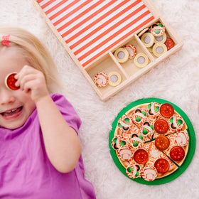 Melissa & Doug pizza play set fits with other kitchen toys for expanded stories