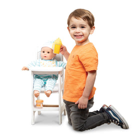 Melissa & Doug high chair features a clean white finish for timeless doll meals.