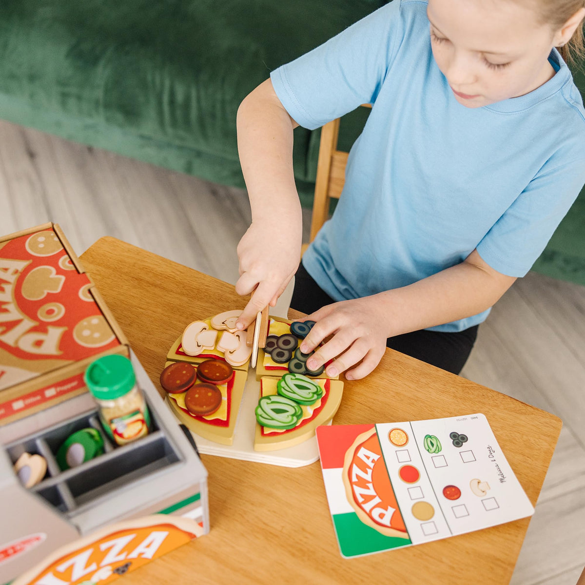 Melissa & Doug play money for practicing pretend payments and math during play.
