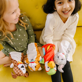 Melissa & Doug Playful Pets hand puppets sized for kids and adults to share storytelling.