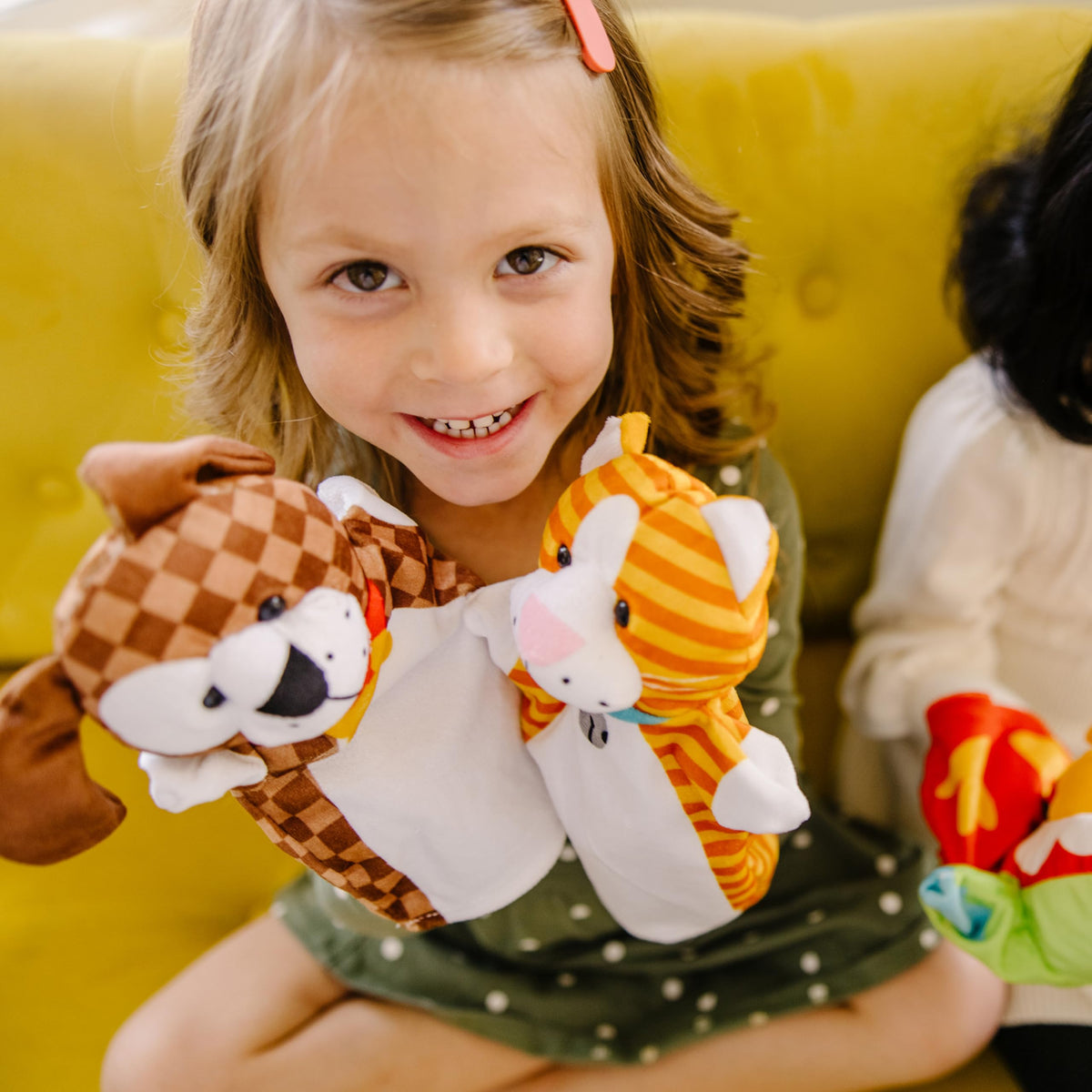 Melissa & Doug Playful Pets hand puppet set with soft plush material for cuddly play.