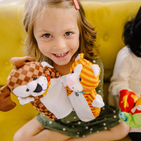 Melissa & Doug Playful Pets hand puppet set with soft plush material for cuddly play.