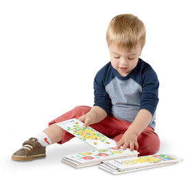 Melissa & Doug Poke-a-Dot Colors card promotes color identification through touch.