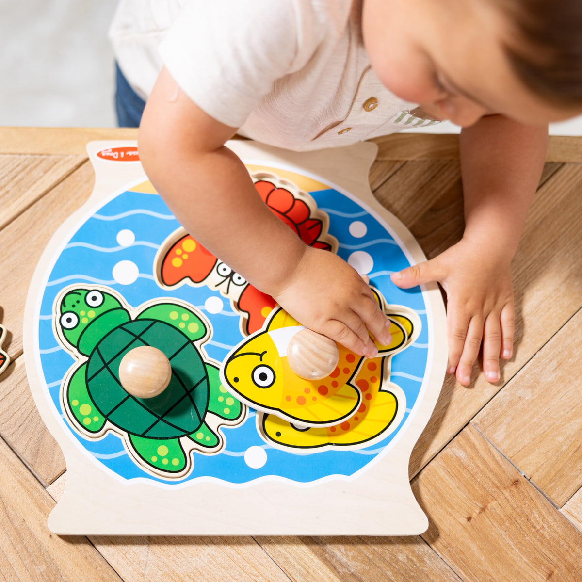 Melissa & Doug Puppy kitten bird puzzle pieces encourage shape matching.