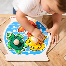 Melissa & Doug Puppy kitten bird puzzle pieces encourage shape matching.