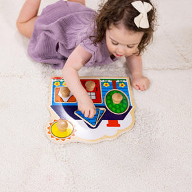 Close-up of sturdy wooden knobs, Melissa & Doug, easy grip for tiny hands
