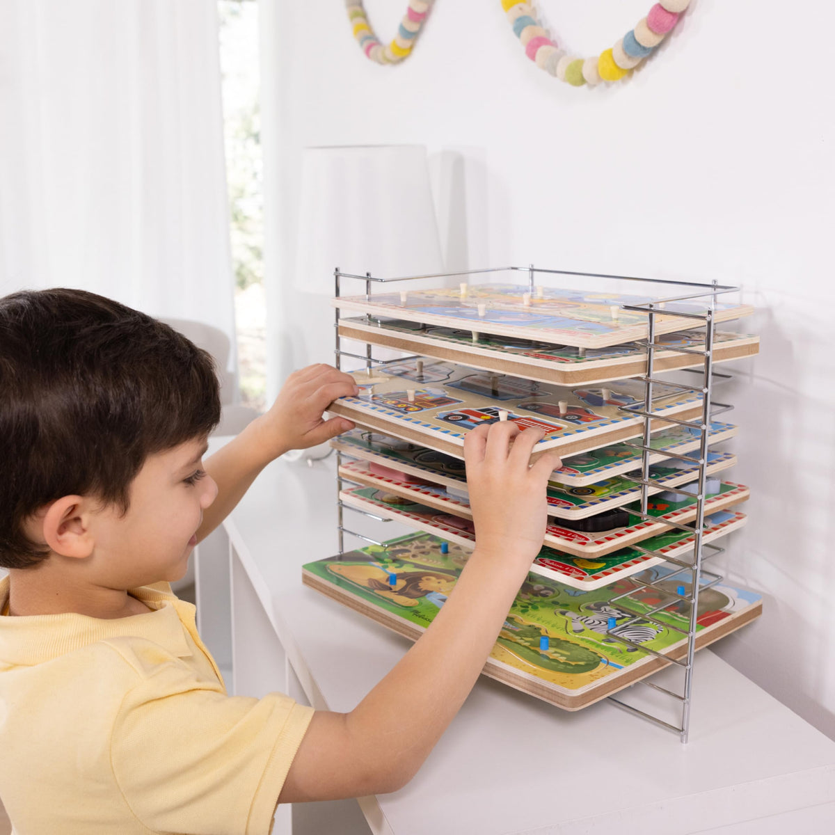 Keeps play area tidy and clutter-free during puzzle time