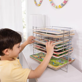 Keeps play area tidy and clutter-free during puzzle time