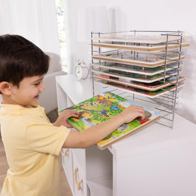 Rack holding six large and six small puzzles for quick access