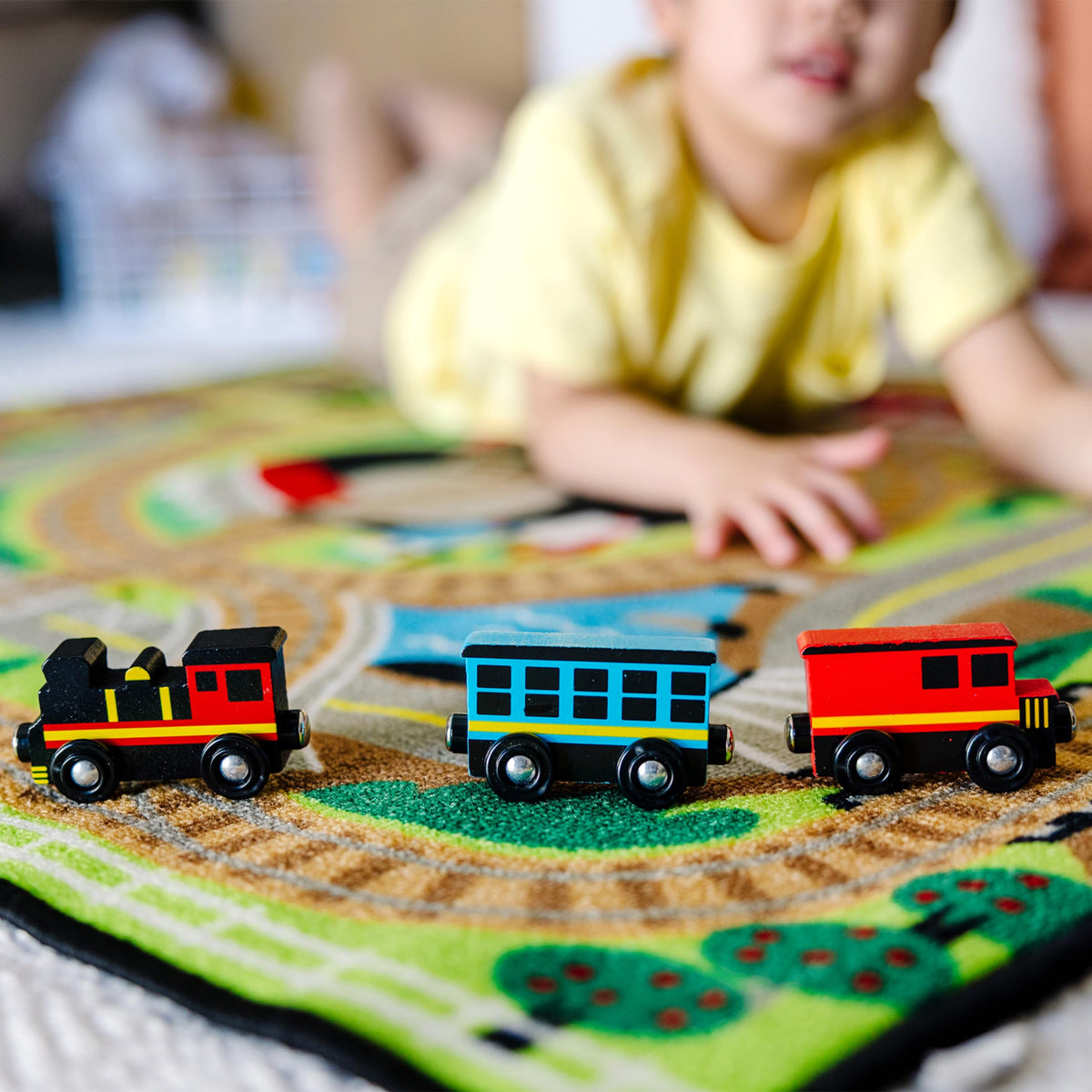 Melissa & Doug Round the Rails road and crossings create realistic scenery